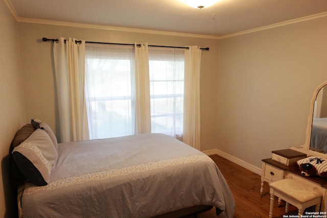 215 Five Oaks, San Antonio, TX 78209 - bedroom with dark wood finished floors, baseboards, and crown molding