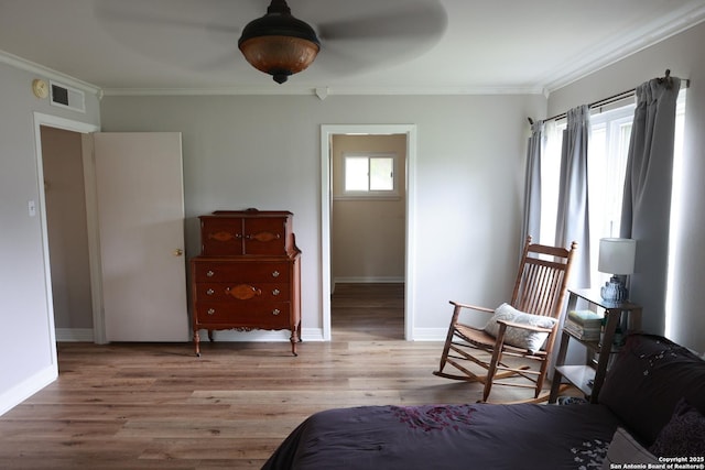 215 Five Oaks, San Antonio, TX 78209 - bedroom with crown molding, light wood-style floors, baseboards, and a ceiling fan