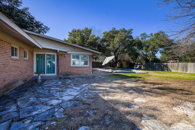 215 Five Oaks, San Antonio, TX 78209 - fenced backyard with a swimming pool and a patio