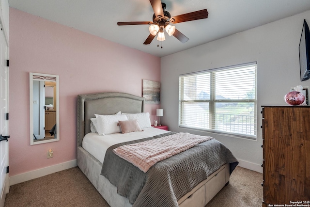 24435 Canyon Row, San Antonio, TX 78260 - carpeted bedroom with baseboards and ceiling fan