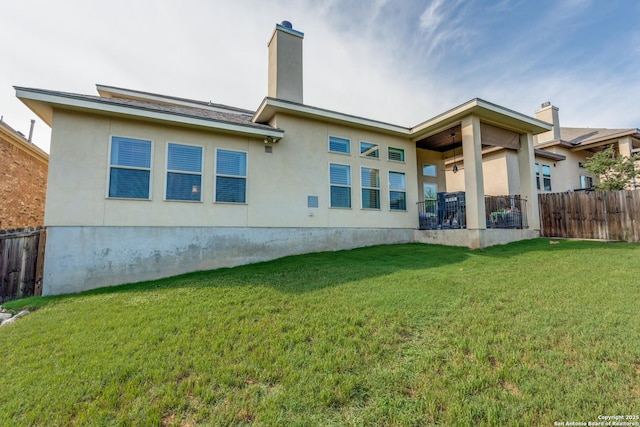 24435 Canyon Row, San Antonio, TX 78260 - back of house with stucco siding and a chimney