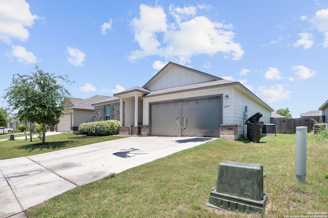 6907 Emerald Vly, San Antonio, TX 78242 - ranch-style house featuring central air condition unit, driveway, an attached garage, and board and batten siding