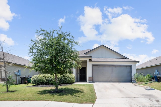 6907 Emerald Vly, San Antonio, TX 78242 - ranch-style home featuring a garage, driveway, a front lawn, and board and batten siding