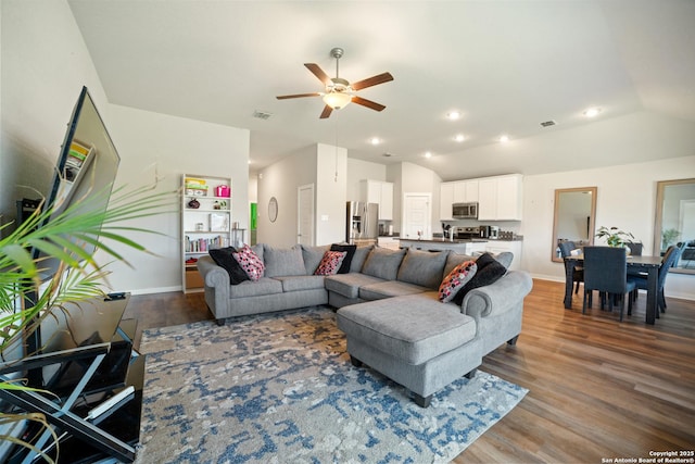 6907 Emerald Vly, San Antonio, TX 78242 - living area with lofted ceiling, ceiling fan, dark wood-style flooring, baseboards, and recessed lighting