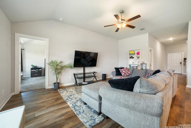 6907 Emerald Vly, San Antonio, TX 78242 - living area featuring ceiling fan, dark wood-type flooring, lofted ceiling, and baseboards