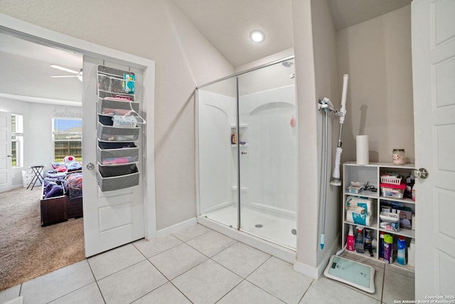 6907 Emerald Vly, San Antonio, TX 78242 - full bathroom with ceiling fan, a stall shower, baseboards, and tile patterned flooring