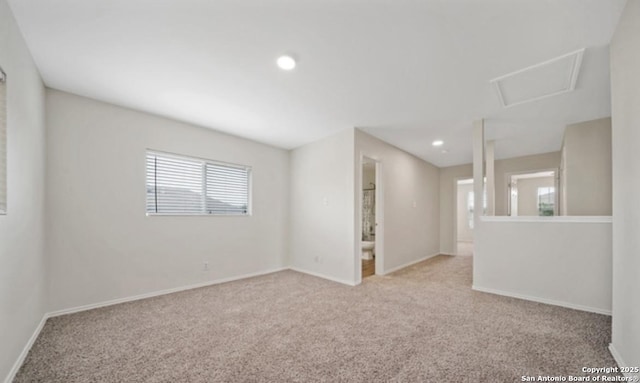 4039 Privet, San Antonio, TX 78259 - unfurnished room with carpet floors, baseboards, recessed lighting, and attic access