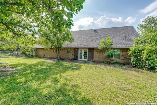 289 Deer Slayer, Seguin, TX 78155 - rear view of house with french doors, brick siding, and a shingled roof