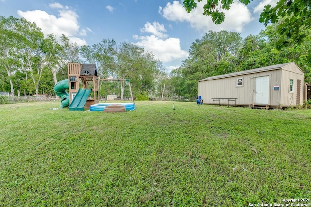 289 Deer Slayer, Seguin, TX 78155 - view of grassy yard with an outbuilding and view of scattered trees