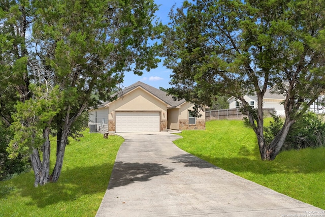 1355 Lasso, Canyon Lake, TX 78133 - view of front of house featuring concrete driveway, an attached garage, stucco siding, stone siding, and cooling unit