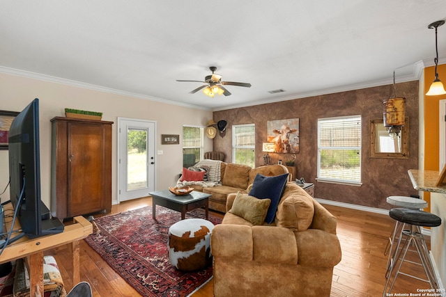 1355 Lasso, Canyon Lake, TX 78133 - living area with ceiling fan, light wood finished floors, baseboards, and crown molding