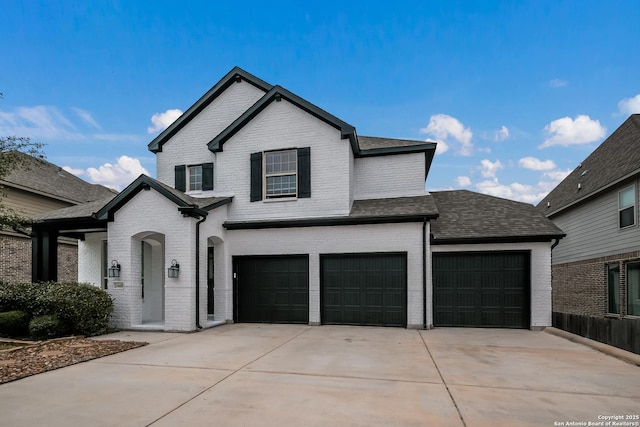 25448 River Ledge, San Antonio, TX 78255 - view of front facade featuring brick siding, concrete driveway, a garage, and roof with shingles
