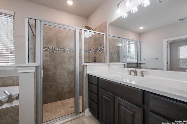 25448 River Ledge, San Antonio, TX 78255 - bathroom with a shower stall, vanity, a bath, and healthy amount of natural light