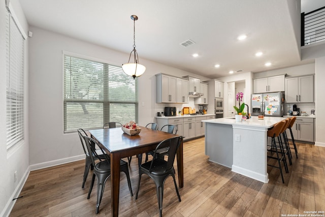 375 Sonata Cyn, Spring Branch, TX 78070 - dining area with recessed lighting, light wood-style floors, and baseboards