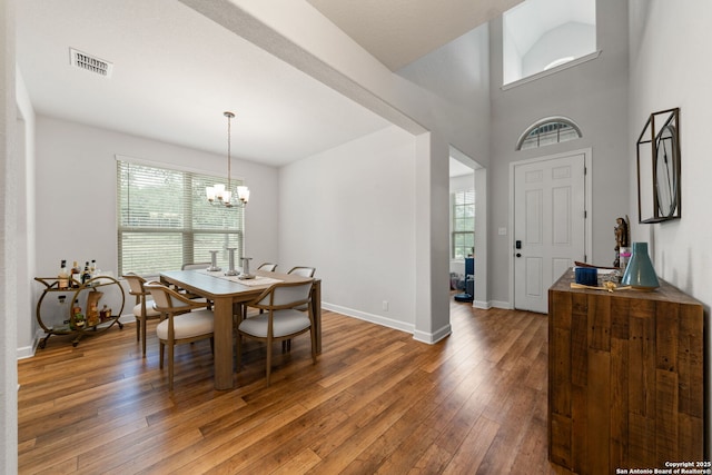 375 Sonata Cyn, Spring Branch, TX 78070 - dining room with healthy amount of natural light, hardwood / wood-style floors, baseboards, and a chandelier