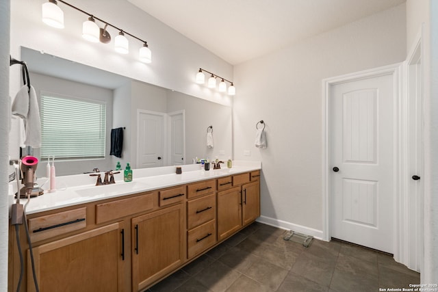 375 Sonata Cyn, Spring Branch, TX 78070 - full bath featuring double vanity, tile patterned flooring, and baseboards