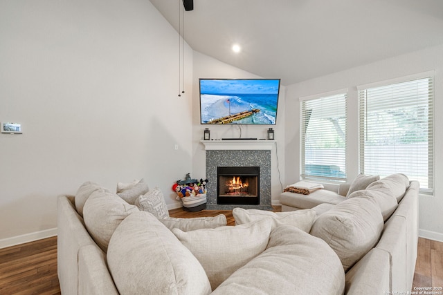 375 Sonata Cyn, Spring Branch, TX 78070 - living area featuring lofted ceiling, baseboards, wood finished floors, and a tile fireplace