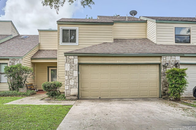8517 Echo Crk, San Antonio, TX 78240 - view of front of home with stone siding, concrete driveway, and a garage
