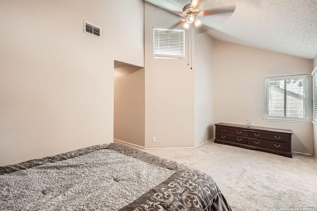 8517 Echo Crk, San Antonio, TX 78240 - carpeted bedroom featuring a textured ceiling, vaulted ceiling, and ceiling fan