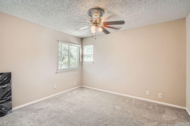 8517 Echo Crk, San Antonio, TX 78240 - carpeted empty room featuring a ceiling fan, baseboards, and a textured ceiling