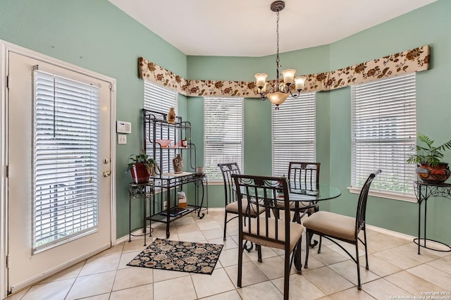 1730 Escada, San Antonio, TX 78258 - dining room with a chandelier, light tile patterned floors, and healthy amount of natural light