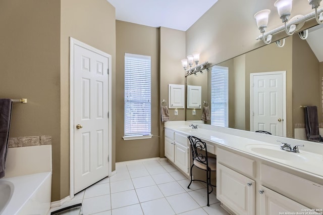 1730 Escada, San Antonio, TX 78258 - bathroom with double vanity, a garden tub, tile patterned floors, and a chandelier