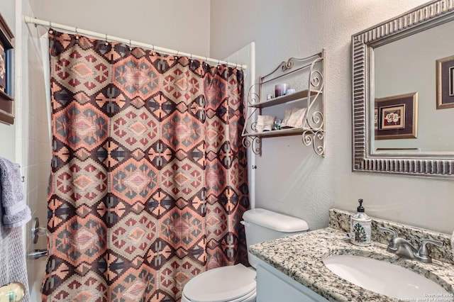1730 Escada, San Antonio, TX 78258 - full bath featuring vanity, toilet, a shower with shower curtain, and a textured wall