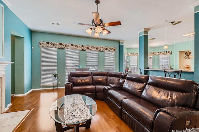 1730 Escada, San Antonio, TX 78258 - living area with a ceiling fan and wood finished floors