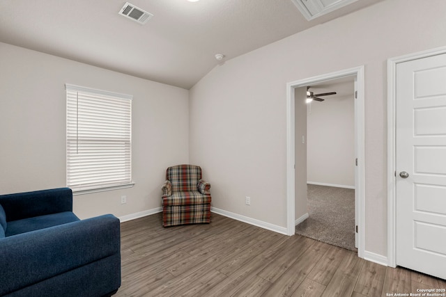 3065 Charyn Way, New Braunfels, TX 78132 - sitting room with light wood-style flooring, baseboards, and vaulted ceiling