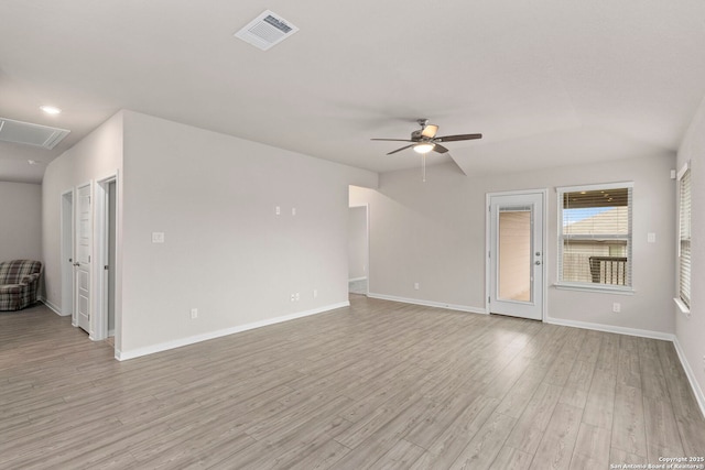 3065 Charyn Way, New Braunfels, TX 78132 - unfurnished living room with ceiling fan, light wood-style floors, baseboards, and attic access