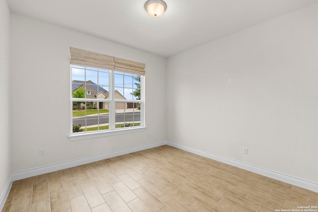 3082 Bright Skies, San Antonio, TX 78261 - spare room with light wood-type flooring and baseboards