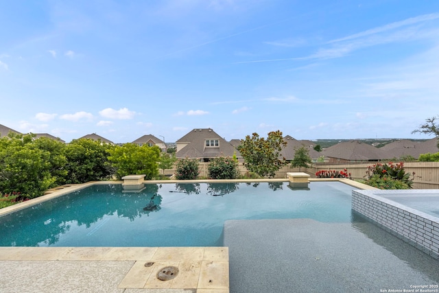 3082 Bright Skies, San Antonio, TX 78261 - view of swimming pool with a fenced backyard and a residential view