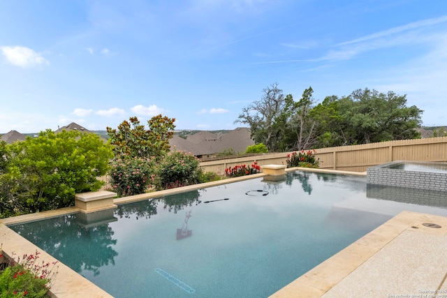 3082 Bright Skies, San Antonio, TX 78261 - view of swimming pool with a fenced backyard and a pool with connected hot tub
