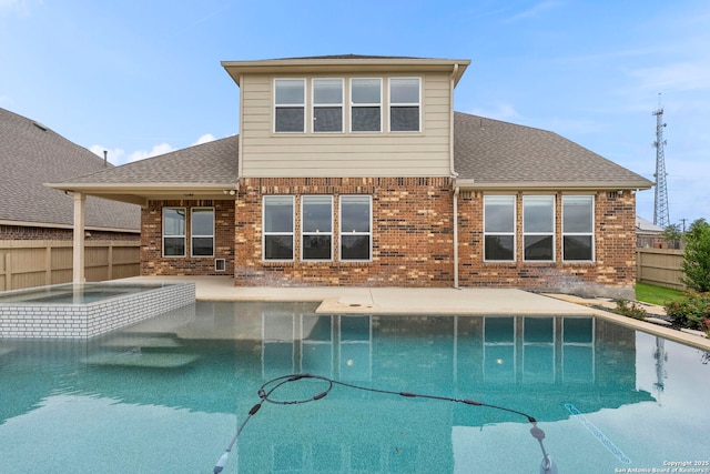 3082 Bright Skies, San Antonio, TX 78261 - view of swimming pool with a pool with connected hot tub and a patio