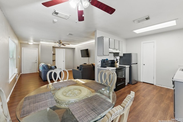 2435 Westgard, San Antonio, TX 78245 - dining area with ceiling fan and wood finished floors