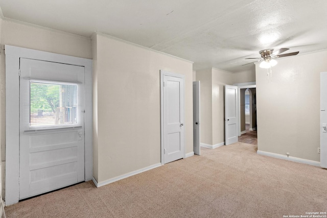 1001 Mason, San Antonio, TX 78208 - empty room with light colored carpet, ceiling fan, and baseboards