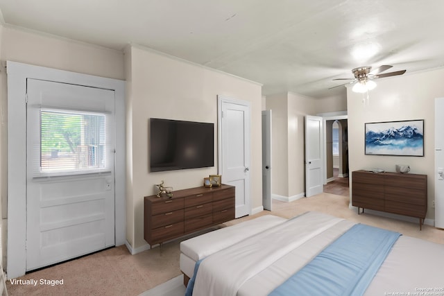 1001 Mason, San Antonio, TX 78208 - bedroom with light colored carpet, baseboards, ceiling fan, and arched walkways