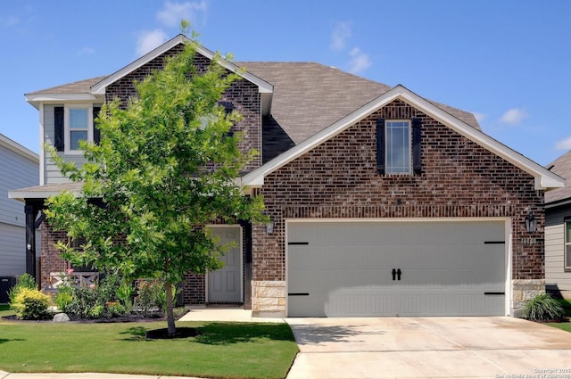 14468 Gecko Lndg, San Antonio, TX 78253 - view of front facade featuring brick siding, concrete driveway, a garage, and stone siding