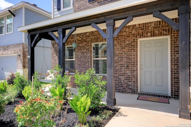 14468 Gecko Lndg, San Antonio, TX 78253 - entrance to property with brick siding and a porch