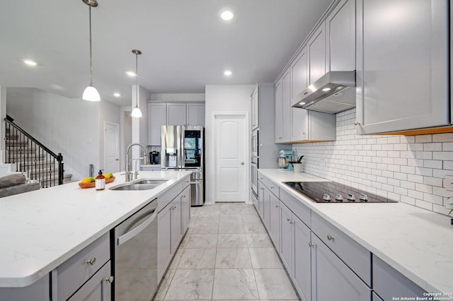 14468 Gecko Lndg, San Antonio, TX 78253 - kitchen with appliances with stainless steel finishes, a sink, wall chimney exhaust hood, gray cabinetry, and recessed lighting