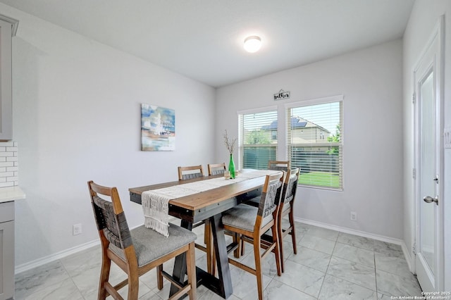14468 Gecko Lndg, San Antonio, TX 78253 - dining space featuring light marble finish floors and baseboards