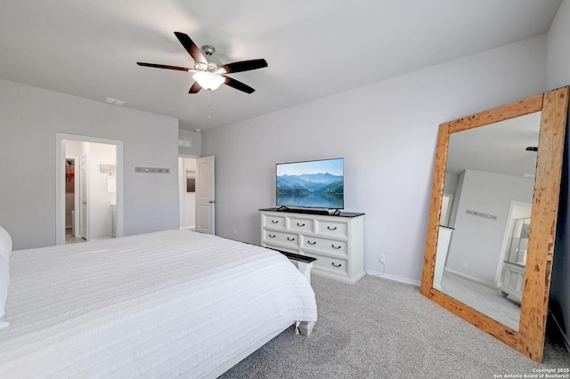14468 Gecko Lndg, San Antonio, TX 78253 - bedroom featuring carpet flooring, ceiling fan, ensuite bath, and baseboards