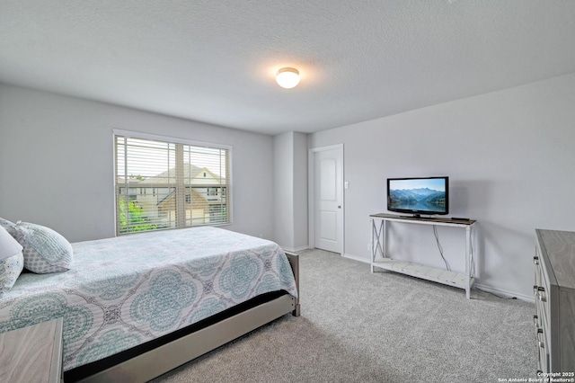 14468 Gecko Lndg, San Antonio, TX 78253 - carpeted bedroom featuring baseboards and a textured ceiling