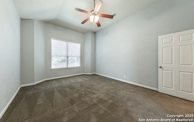 1210 Magellan, Windcrest, TX 78239 - spare room featuring carpet, ceiling fan, baseboards, and vaulted ceiling