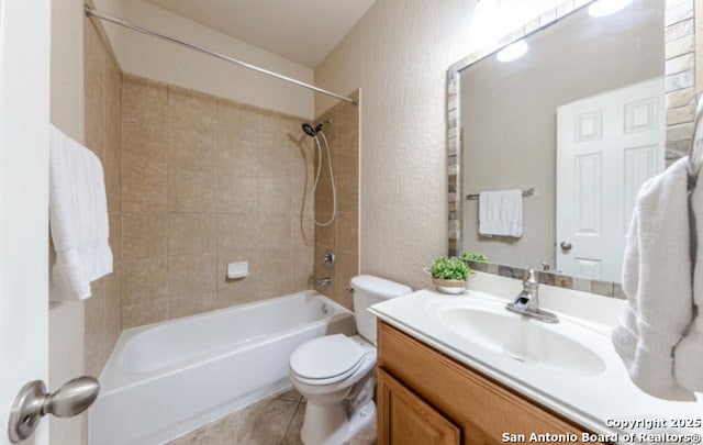 1210 Magellan, Windcrest, TX 78239 - full bath with toilet, a textured wall, vanity, shower / bathtub combination, and tile patterned flooring