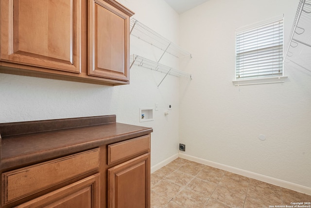 1210 Magellan, Windcrest, TX 78239 - laundry room featuring electric dryer hookup, washer hookup, cabinet space, hookup for a gas dryer, and baseboards