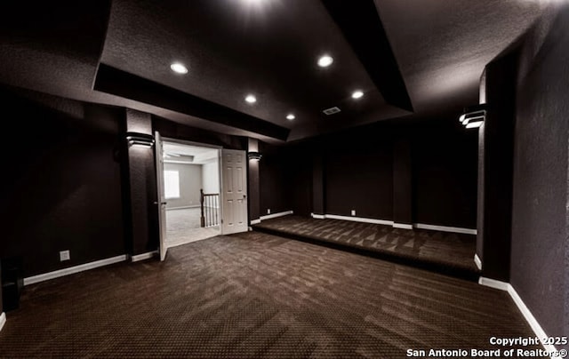 1210 Magellan, Windcrest, TX 78239 - carpeted home theater featuring a tray ceiling, baseboards, and recessed lighting