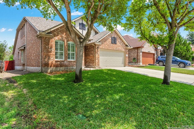 1210 Magellan, Windcrest, TX 78239 - traditional-style house featuring brick siding, an attached garage, concrete driveway, and a shingled roof