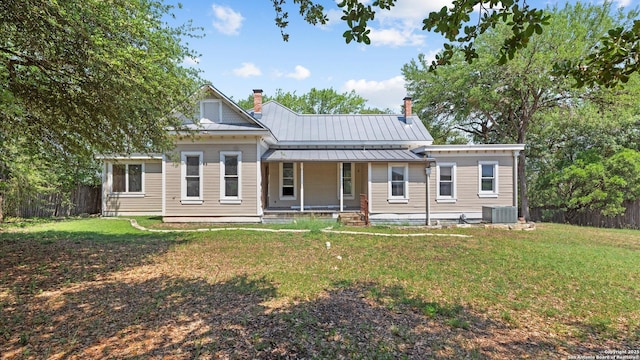 160 E Klein, New Braunfels, TX 78130 - view of front of property featuring covered porch, central AC unit, a chimney, metal roof, and a standing seam roof