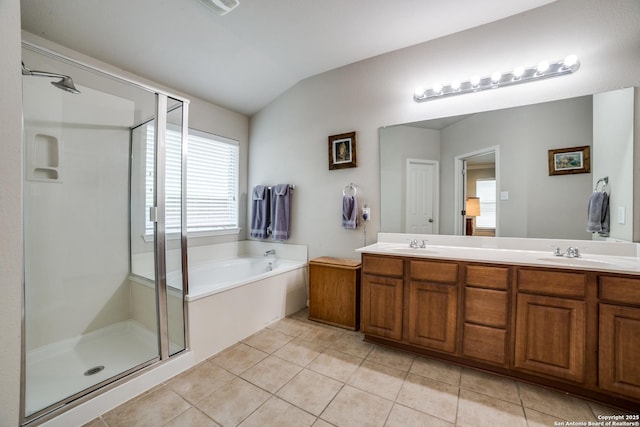 703 Point Spgs, San Antonio, TX 78253 - bathroom featuring vaulted ceiling, a stall shower, double vanity, a bath, and tile patterned floors
